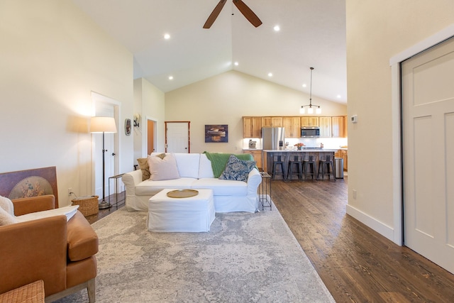 716 Shadow Dancer Way, Stevensville, MT 59870 - living room featuring a ceiling fan, dark wood-style flooring, high vaulted ceiling, and recessed lighting
