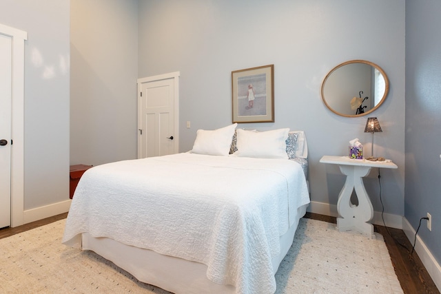 716 Shadow Dancer Way, Stevensville, MT 59870 - bedroom with wood finished floors and baseboards