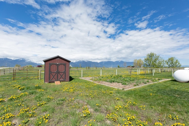 716 Shadow Dancer Way, Stevensville, MT 59870 - view of yard with a storage shed, a mountain view, and a view of countryside