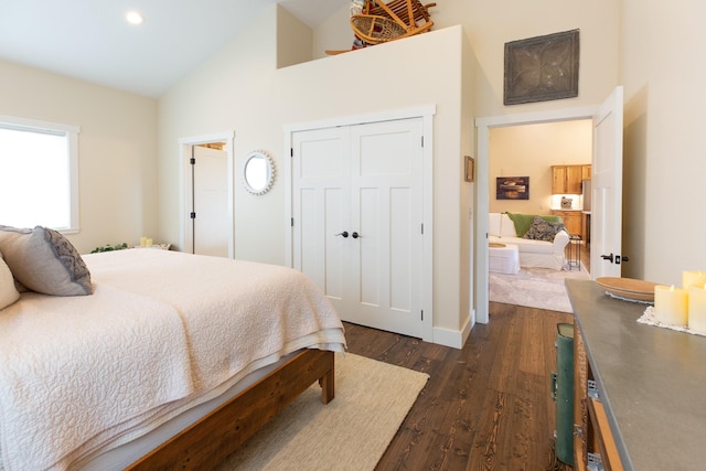 716 Shadow Dancer Way, Stevensville, MT 59870 - bedroom featuring dark wood-style floors, high vaulted ceiling, a closet, and recessed lighting