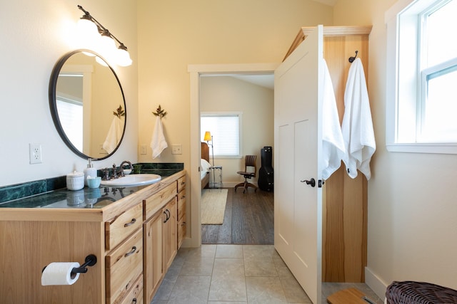 716 Shadow Dancer Way, Stevensville, MT 59870 - full bathroom with vanity and tile patterned flooring