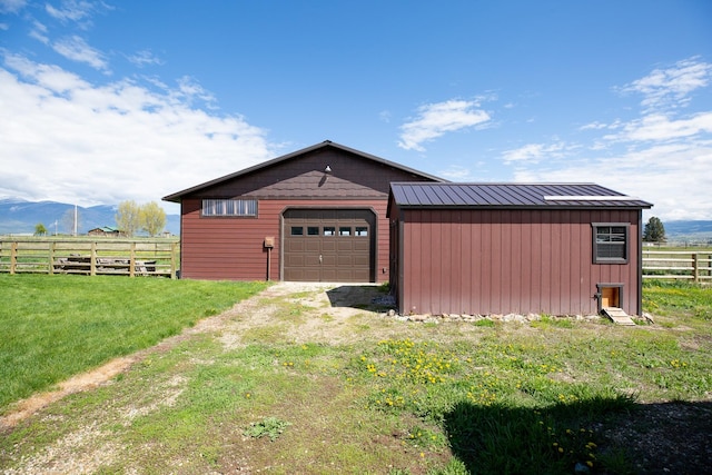 716 Shadow Dancer Way, Stevensville, MT 59870 - detached garage featuring a mountain view