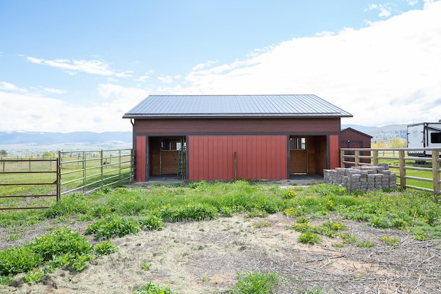 716 Shadow Dancer Way, Stevensville, MT 59870 - view of outdoor structure featuring an exterior structure and a mountain view