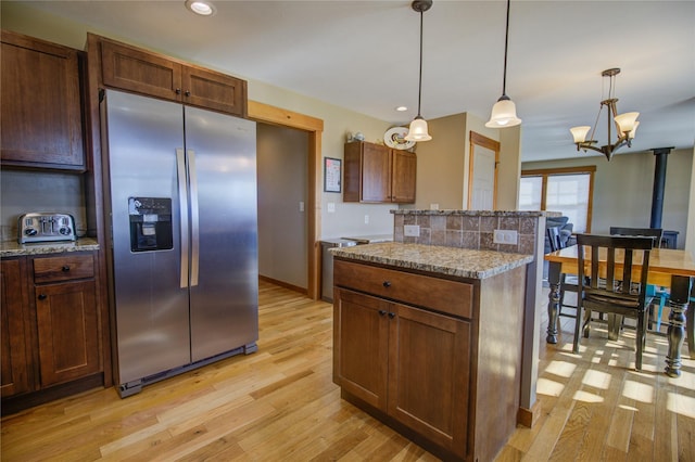 3774 Juliet Dr, Helena, MT 59602 - kitchen featuring decorative light fixtures, stainless steel refrigerator with ice dispenser, a chandelier, and light wood-style flooring