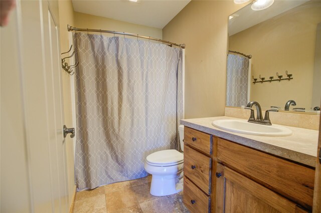 3774 Juliet Dr, Helena, MT 59602 - bathroom with a shower with shower curtain, toilet, and vanity