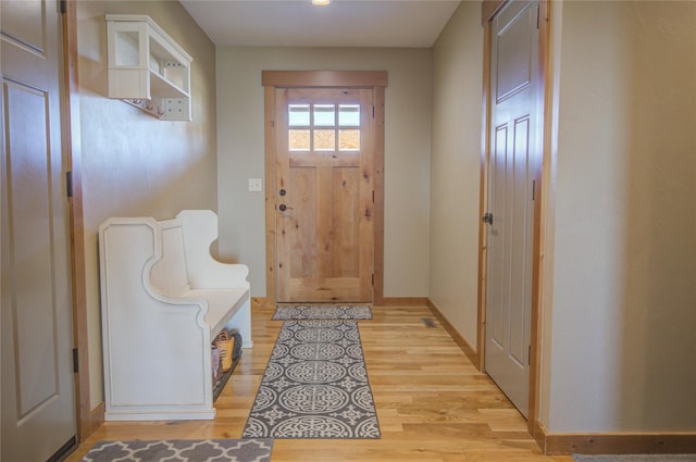 3774 Juliet Dr, Helena, MT 59602 - entryway with baseboards and light wood finished floors