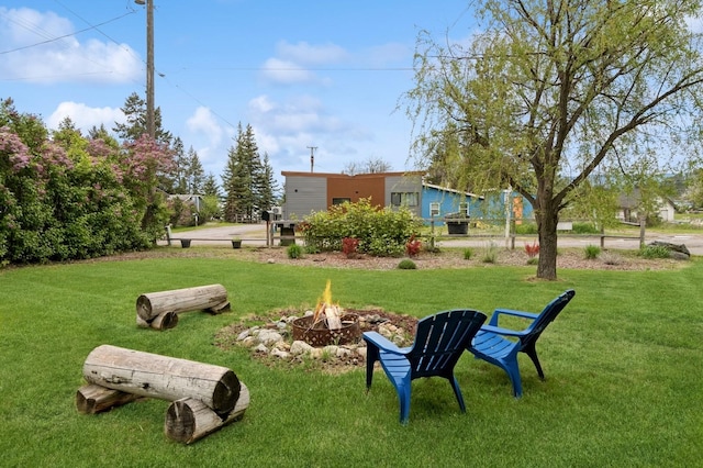 14668 Shore Acres Dr, Bigfork, MT 59911 - view of grassy yard featuring a fire pit