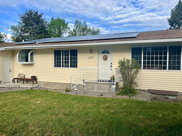 4217 Larkspur Dr, Missoula, MT 59803 - single story home with solar panels and a front yard