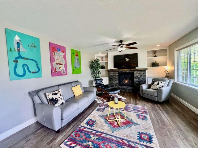 4217 Larkspur Dr, Missoula, MT 59803 - entryway featuring baseboards, dark wood-style flooring, a barn door, and visible vents