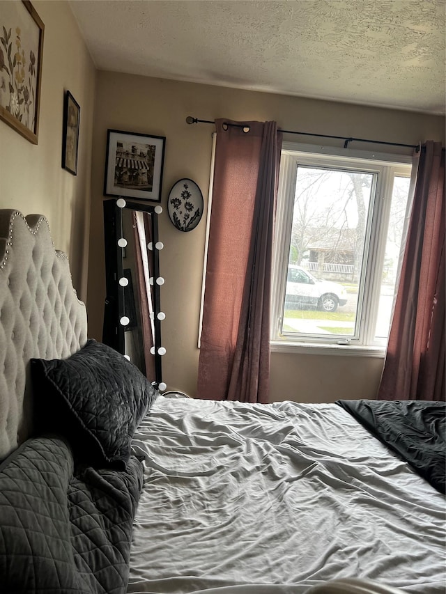 bedroom with a textured ceiling