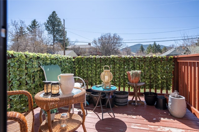 701 N Davis St Unit A, Helena, MT 59601 - wooden deck with a mountain view