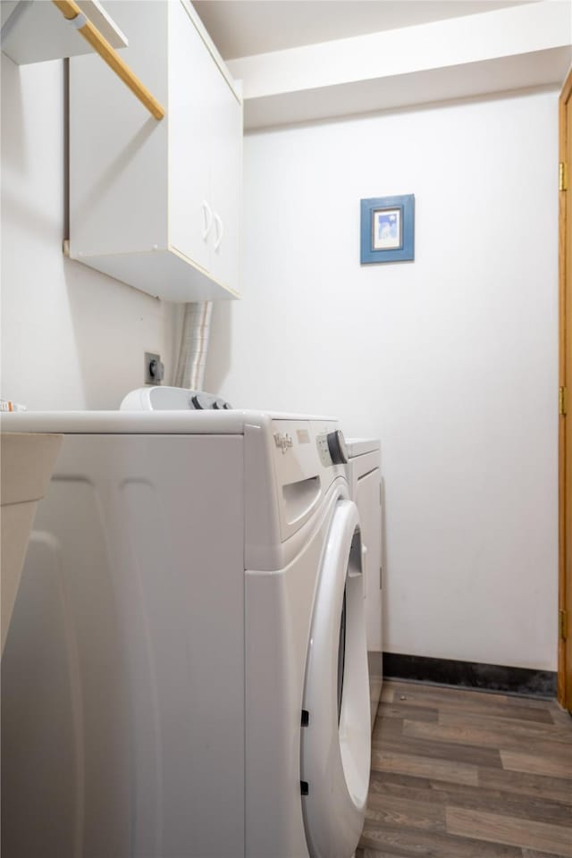 701 N Davis St Unit A, Helena, MT 59601 - laundry area with independent washer and dryer, wood finished floors, and cabinet space