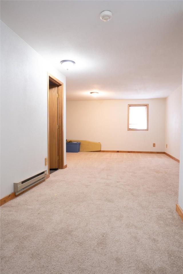 701 N Davis St Unit A, Helena, MT 59601 - empty room featuring baseboard heating, carpet floors, and a smoke detector