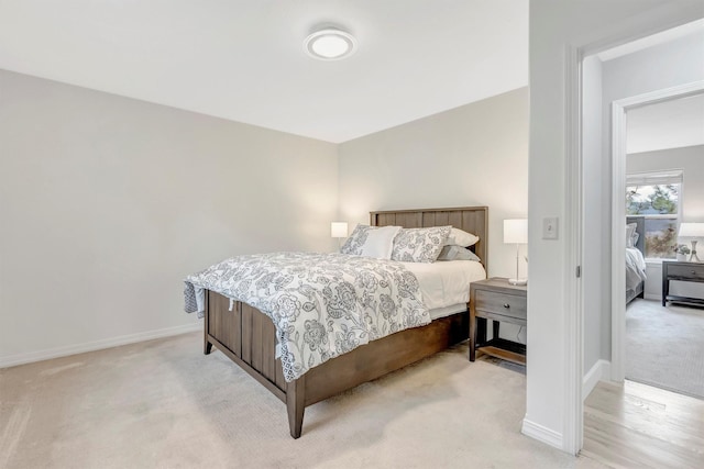 15022 Romulus Ln, Frenchtown, MT 59834 - bedroom with light carpet and baseboards