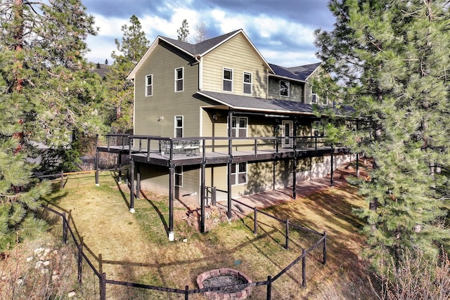 15022 Romulus Ln, Frenchtown, MT 59834 - back of property with a wooden deck and a fenced backyard