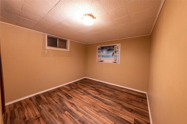 139 Highwood Dr, Libby, MT 59923 - spare room featuring wood finished floors, baseboards, and crown molding