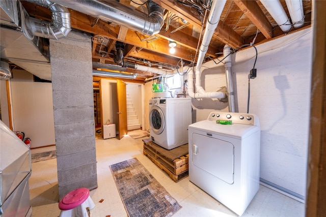 139 Highwood Dr, Libby, MT 59923 - washroom with washing machine and dryer and light floors
