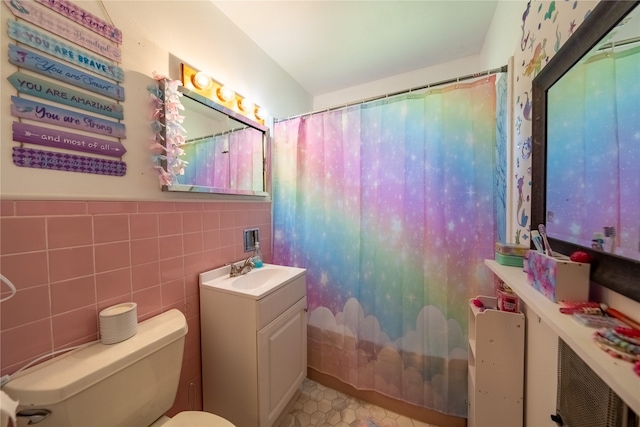 139 Highwood Dr, Libby, MT 59923 - bathroom with vanity and tile walls