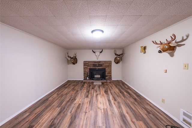 139 Highwood Dr, Libby, MT 59923 - unfurnished living room featuring wood finished floors, ornamental molding, and a fireplace