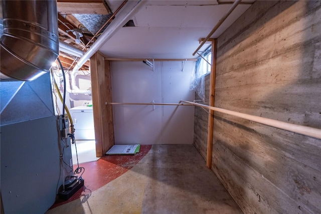 139 Highwood Dr, Libby, MT 59923 - unfinished below grade area featuring heating unit and washer / clothes dryer