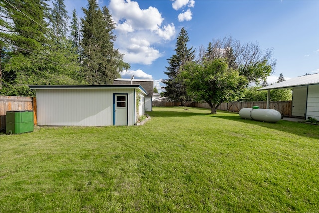 139 Highwood Dr, Libby, MT 59923 - fenced backyard featuring an outdoor structure