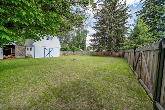 139 Highwood Dr, Libby, MT 59923 - fenced backyard with a barn and an outdoor structure