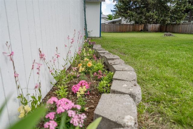 139 Highwood Dr, Libby, MT 59923 - fenced backyard with an outbuilding