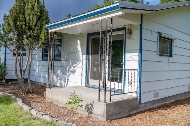 139 Highwood Dr, Libby, MT 59923 - doorway to property featuring a porch