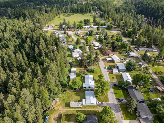 139 Highwood Dr, Libby, MT 59923 - aerial view of property's location with a heavily wooded area and nearby suburban area