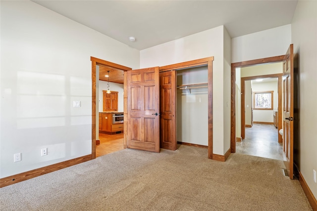 136 N Fork Trl, Columbia Falls, MT 59912 - unfurnished bedroom with light carpet and a closet