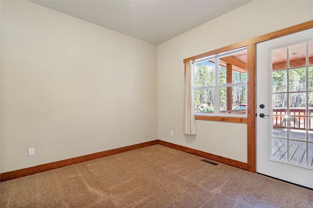 136 N Fork Trl, Columbia Falls, MT 59912 - empty room with carpet flooring and plenty of natural light
