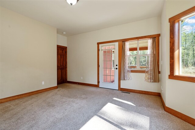 136 N Fork Trl, Columbia Falls, MT 59912 - unfurnished room with carpet floors and baseboards
