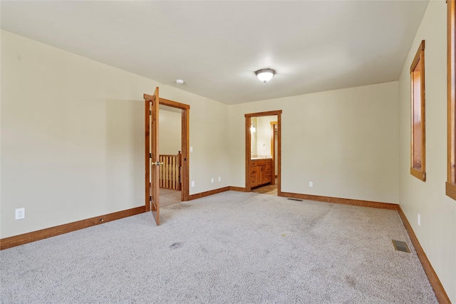 136 N Fork Trl, Columbia Falls, MT 59912 - unfurnished room with light colored carpet and baseboards