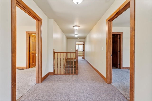 136 N Fork Trl, Columbia Falls, MT 59912 - corridor with an upstairs landing and carpet flooring