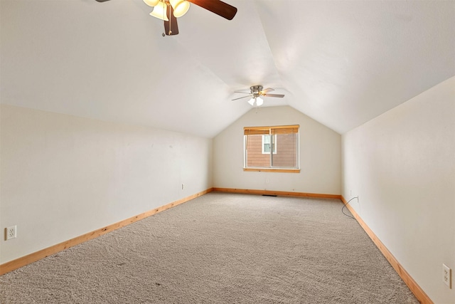 1101 E Gallatin Ave, Belgrade, MT 59714 - bonus room featuring baseboards, a ceiling fan, light colored carpet, and vaulted ceiling