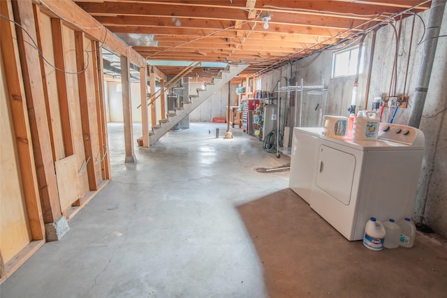 below grade area featuring washer and dryer and stairway