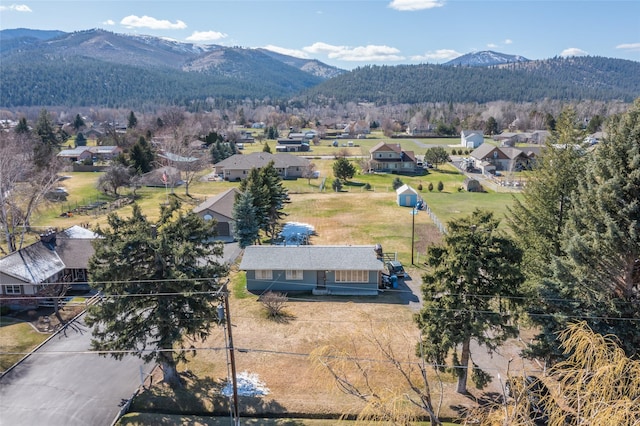 drone / aerial view featuring a mountain view and a residential view