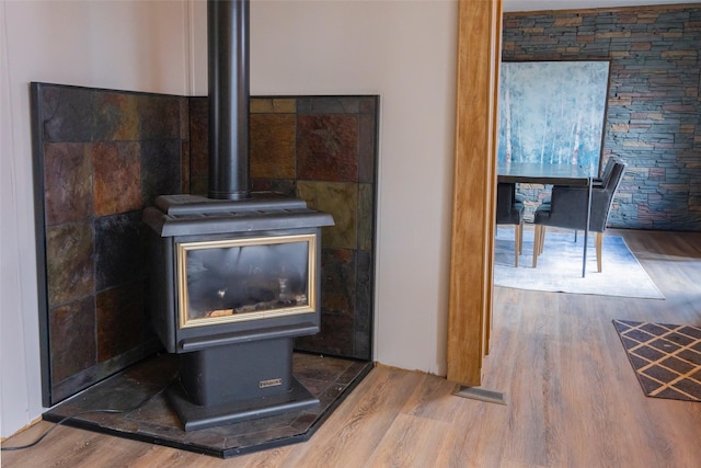 714 Rosalind St, Philipsburg, MT 59858 - detailed view of a wood stove and wood finished floors