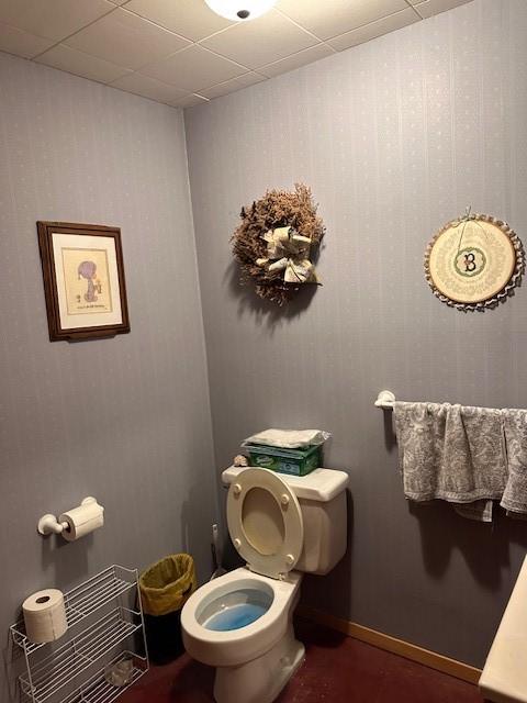 708 Johnson Ln, Superior, MT 59872 - bathroom with wallpapered walls, a drop ceiling, and toilet