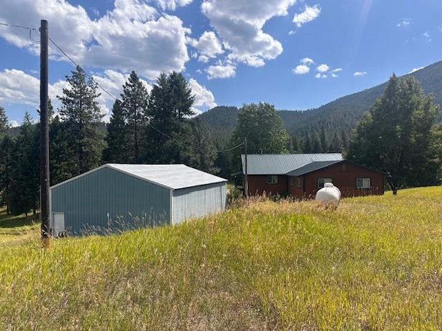 708 Johnson Ln, Superior, MT 59872 - exterior space featuring a view of trees and a mountain view