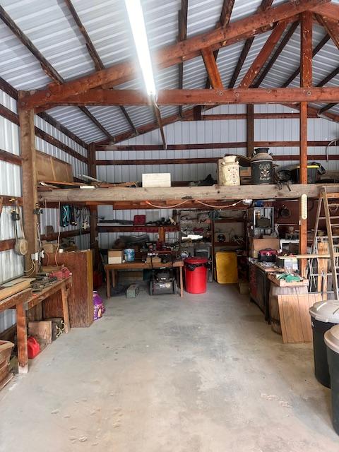 708 Johnson Ln, Superior, MT 59872 - garage featuring a workshop area and metal wall