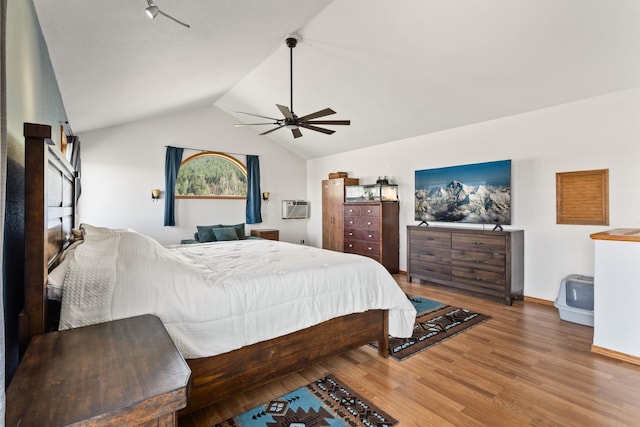 32306 St Ignatius Airport Rd, Saint Ignatius, MT 59865 - bedroom featuring wood finished floors, vaulted ceiling, and ceiling fan