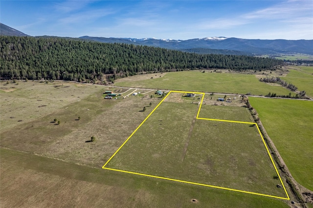 32306 St Ignatius Airport Rd, Saint Ignatius, MT 59865 - aerial view of property's location featuring property parcel outlined and a mountain backdrop