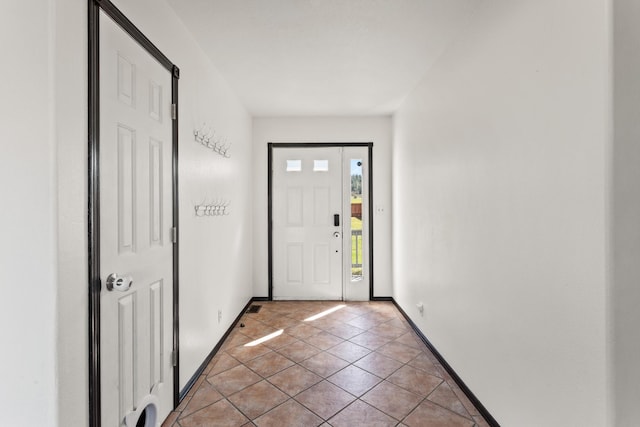 32306 St Ignatius Airport Rd, Saint Ignatius, MT 59865 - foyer with light tile patterned floors and baseboards