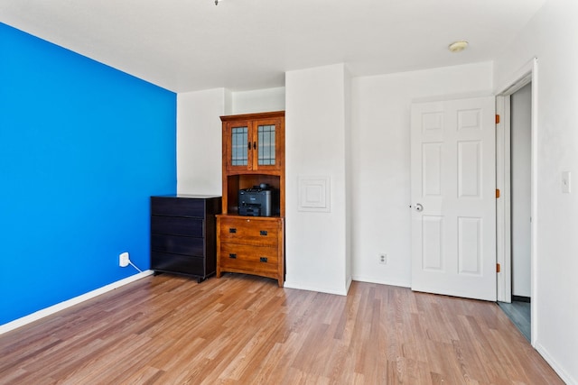 32306 St Ignatius Airport Rd, Saint Ignatius, MT 59865 - unfurnished bedroom with light wood-style floors and baseboards