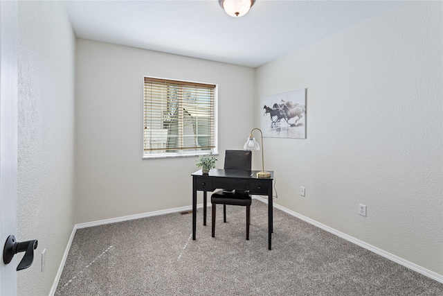 office featuring carpet floors and baseboards