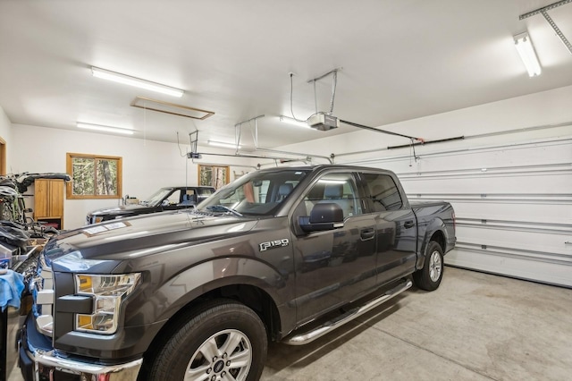 196 Pine Needle Ln, Bigfork, MT 59911 - garage with a garage door opener