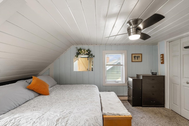 bedroom with baseboard heating, wood ceiling, ceiling fan, carpet floors, and lofted ceiling