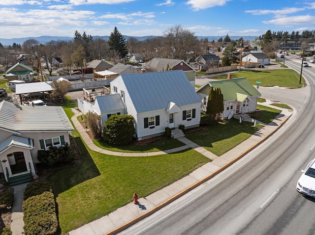 bird's eye view with a residential view and a mountain view