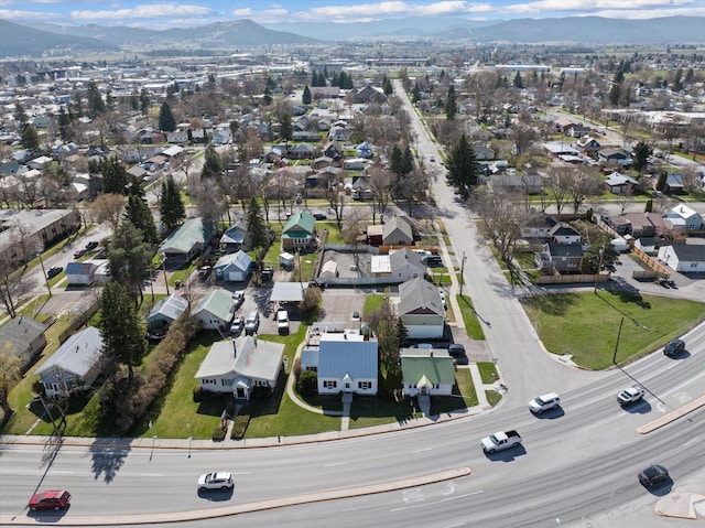 drone / aerial view featuring a mountain view and a residential view